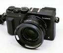 OCCASION Panasonic Lumix DMC-LX100 + Leather Cover + Lens Hood