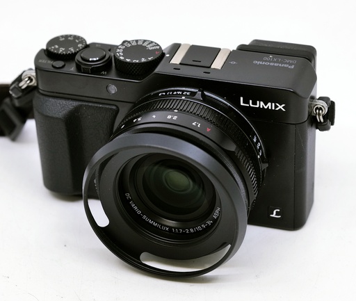 OCCASION Panasonic Lumix DMC-LX100 + Leather Cover + Lens Hood